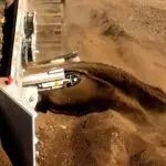 A close up of the tracks on a tractor