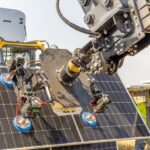 A robot is working on solar panels.